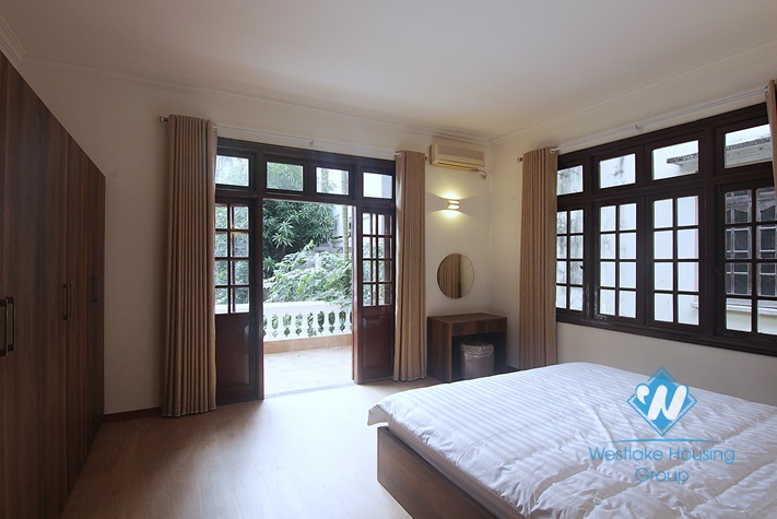 White house with courtyard for rent in Tay Ho district  
